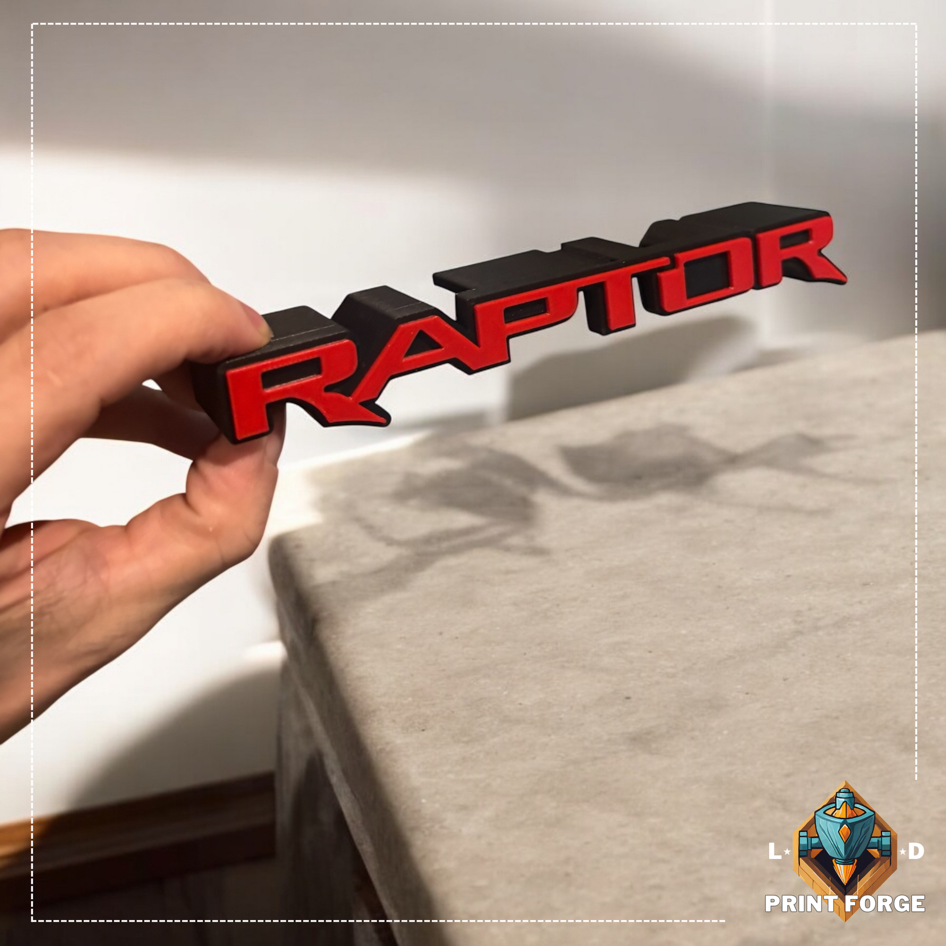 Custom RAPTOR front grille emblem badge installed on grille